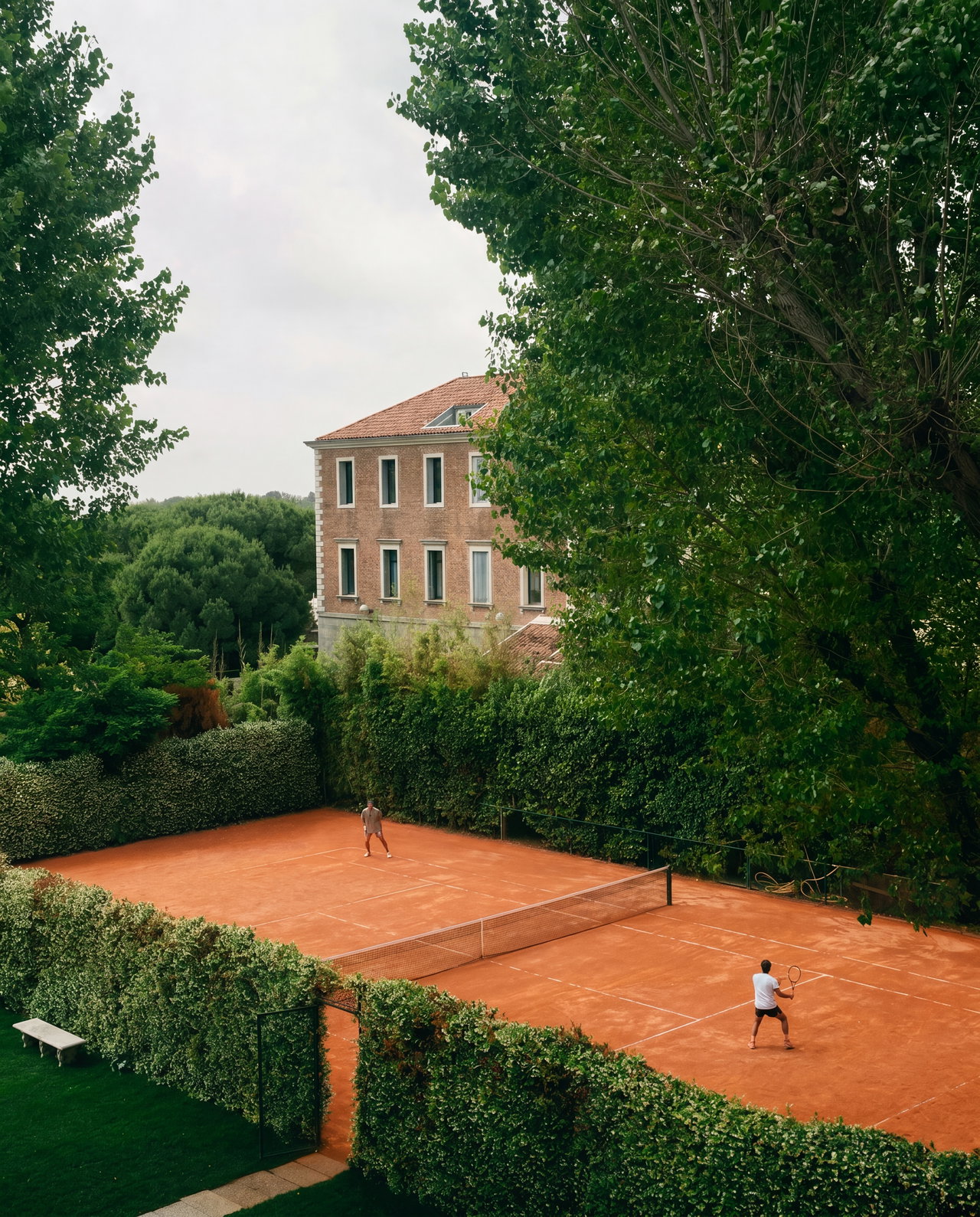 Outdoor Tennis Match on Clay Court