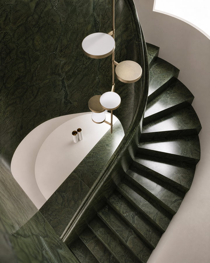 Elegant Spiral Staircase with Green Marble Finish