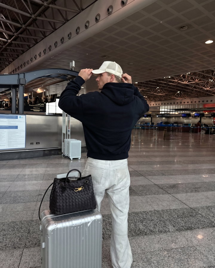 Traveler in Airport Terminal