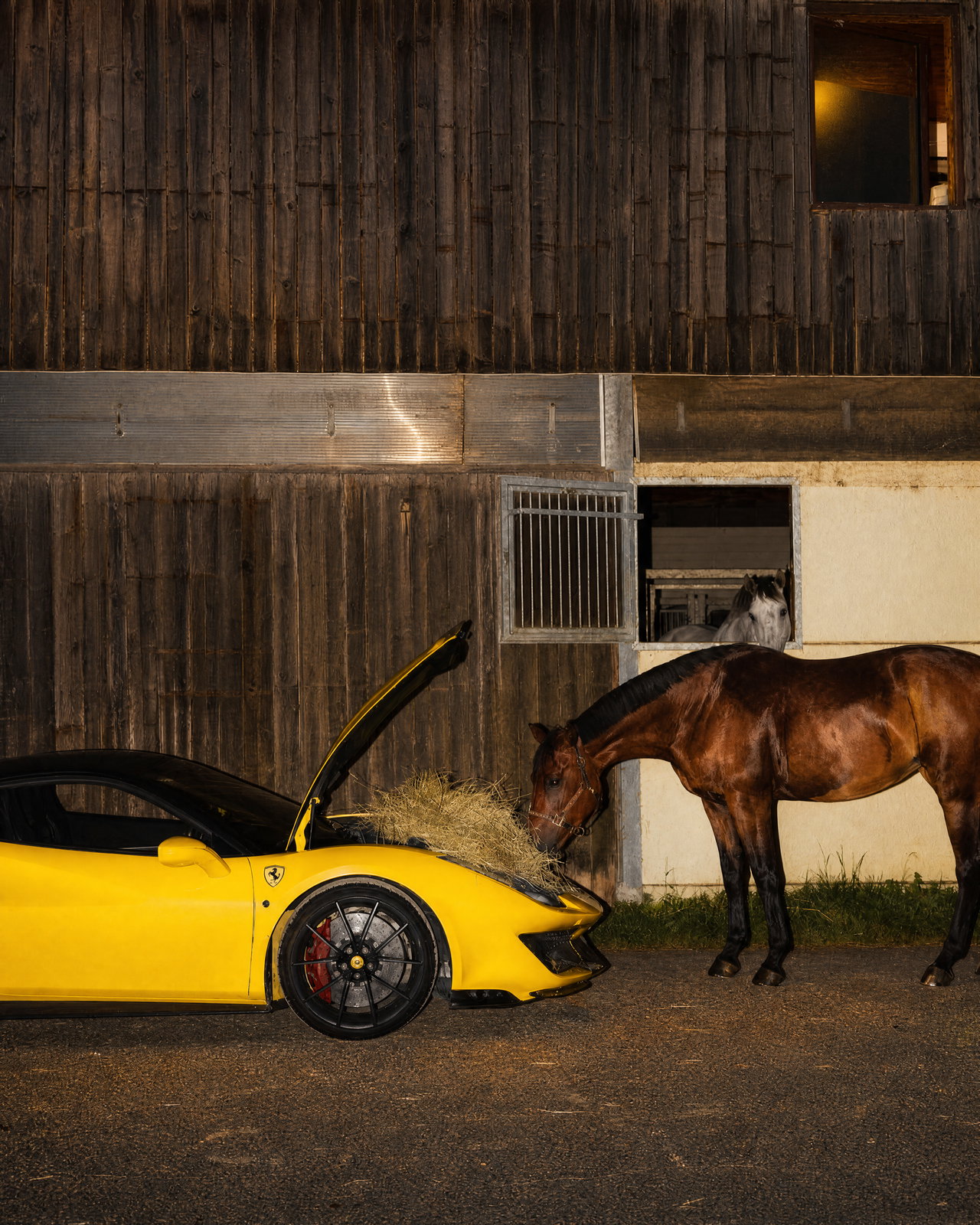 Yellow Sports Car with Hay and Curious Horse