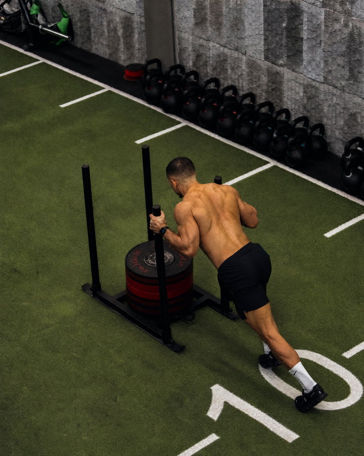 Weighted Sled Push in Gym