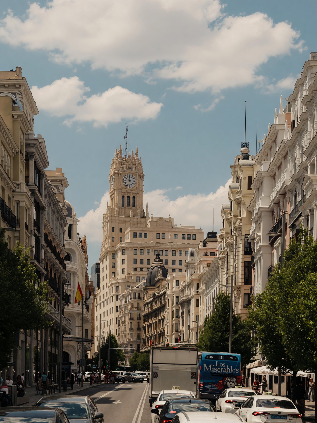 Urban Street Scene with Historic Architecture and Clock Tower