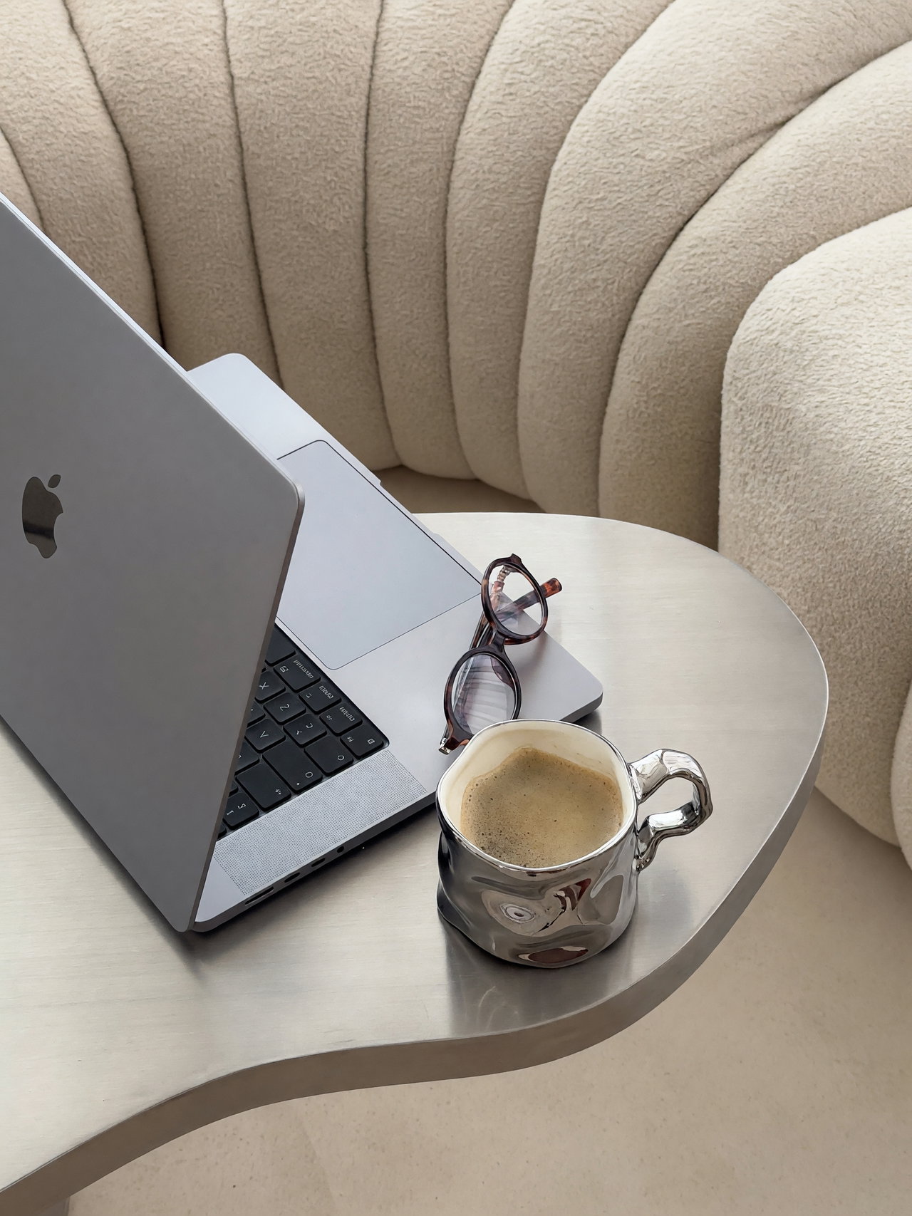 Cozy Workspace with Modern Laptop and Coffee
