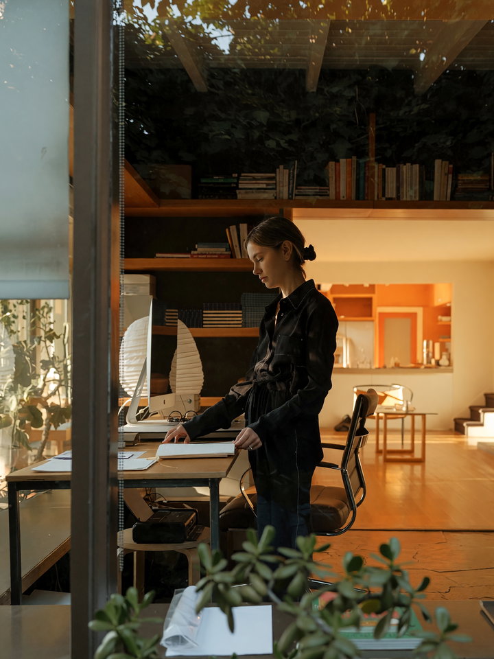 Focused Individual in Minimalist Office Space