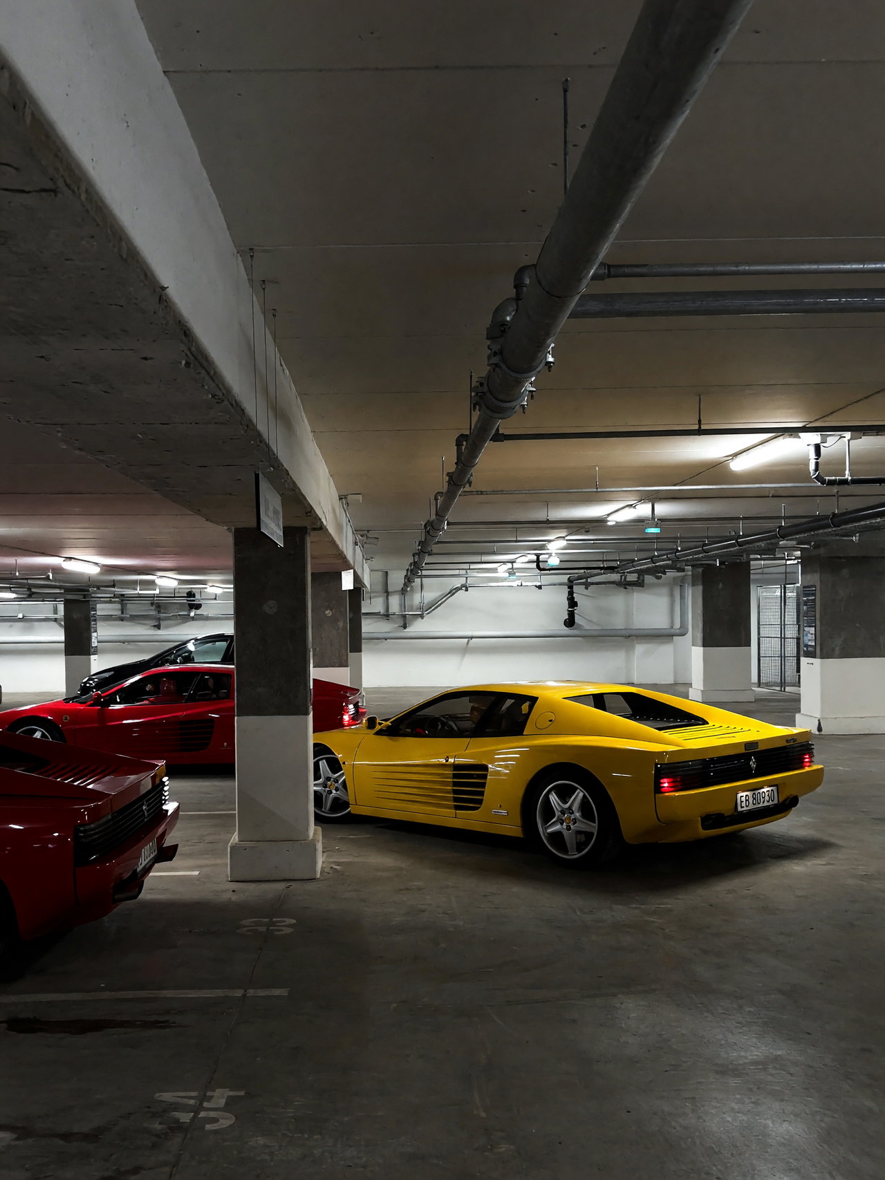 Vibrant Yellow Sports Car in Underground Garage
