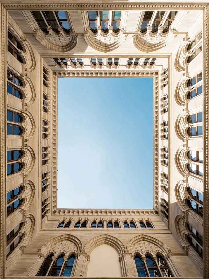 Historic Architectural Courtyard Under Clear Blue Sky