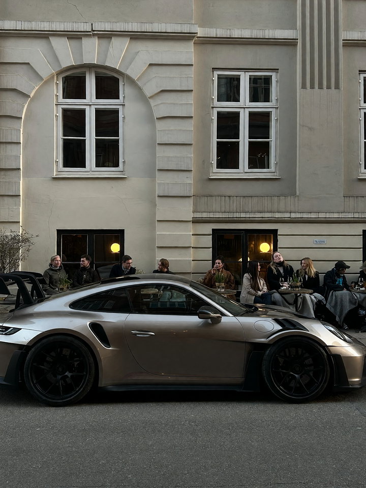 Sleek Silver Sports Car on City Street