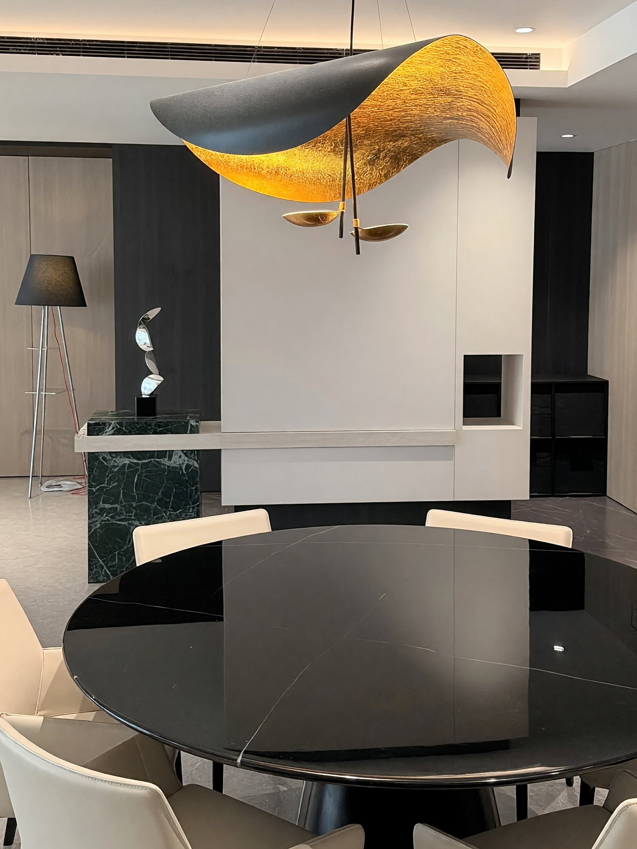 Modern Dining Area with Black Marble Table