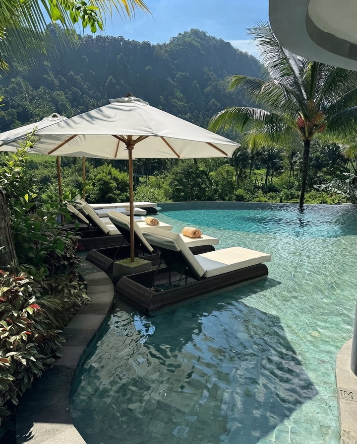Luxurious Infinity Pool Surrounded by Tropical Landscape