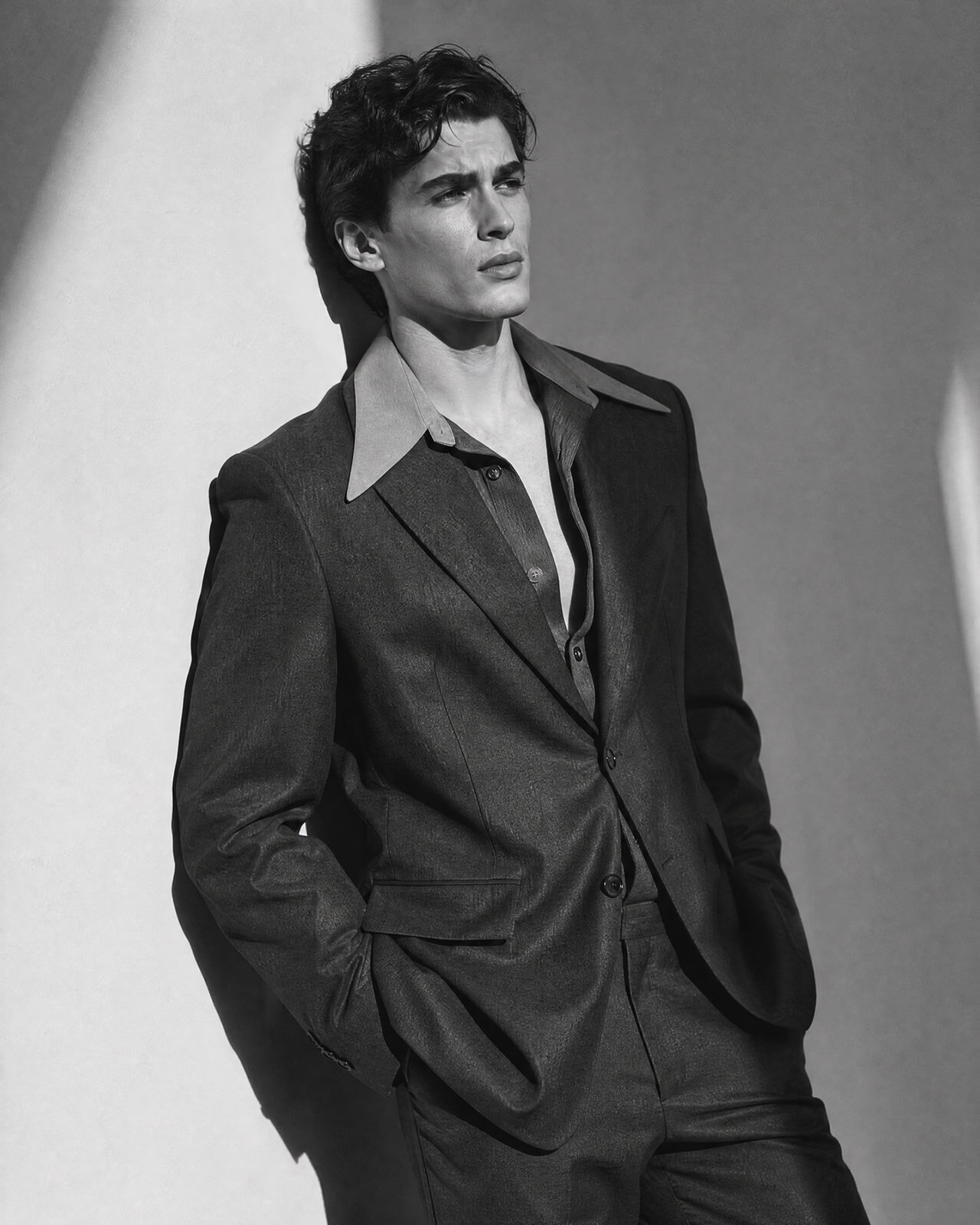 Stylish Young Man in Gray Suit
