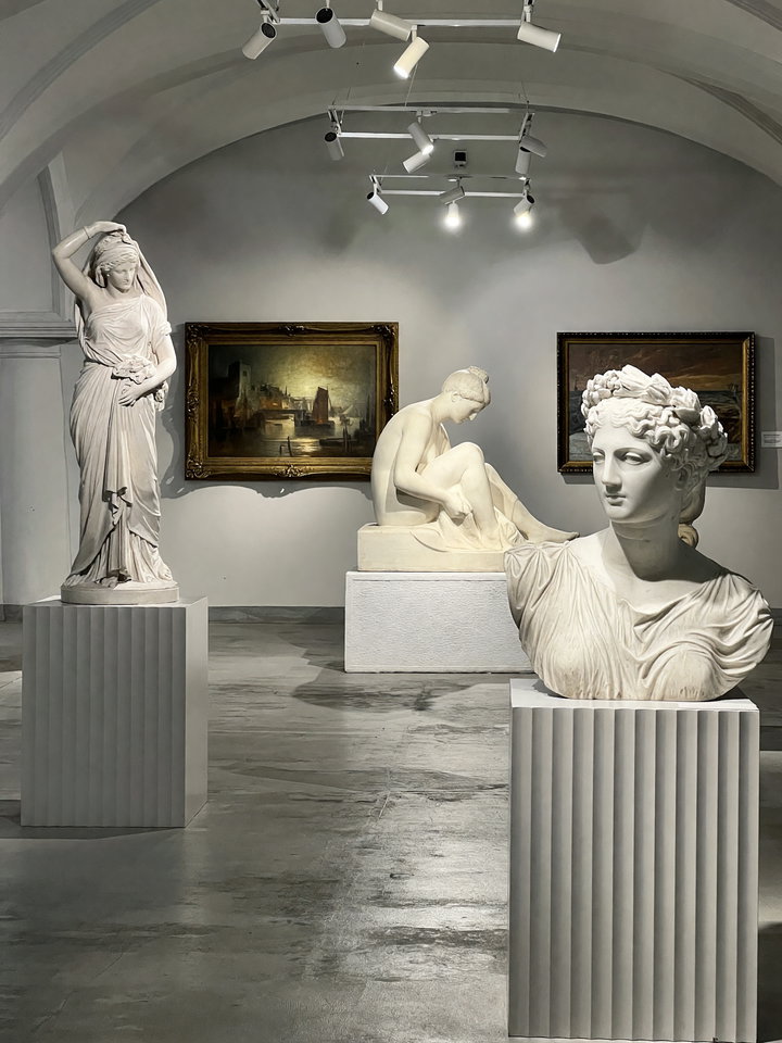 Elegant Museum Gallery with Marble Sculptures