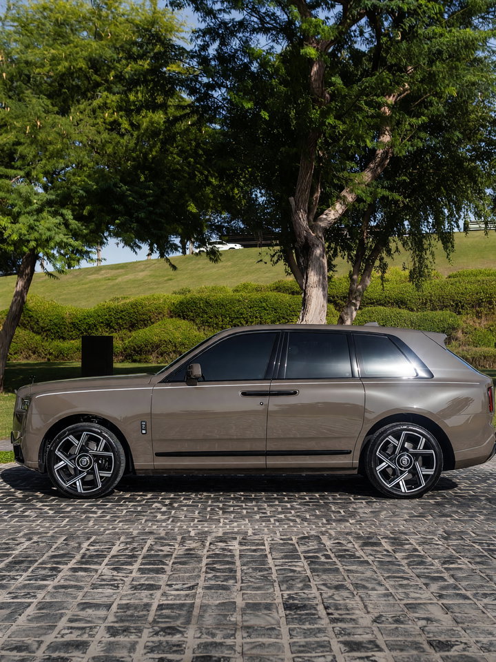 Luxury SUV on Cobblestone Driveway
