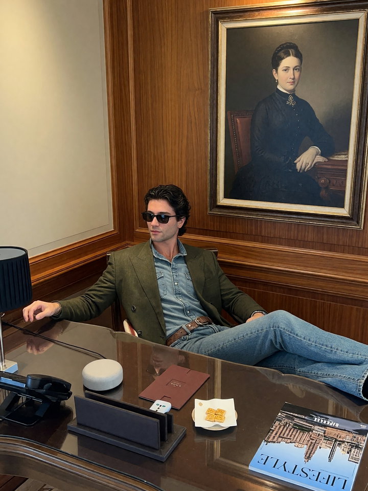 Casual Young Man in Elegant Office