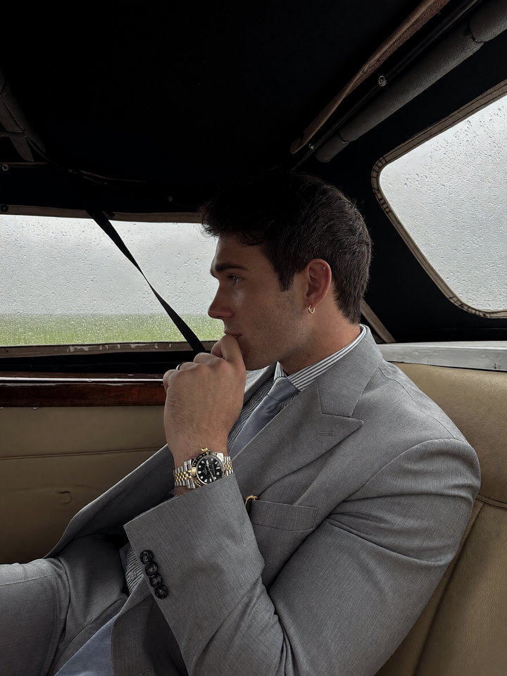 Thoughtful Man in Luxury Car