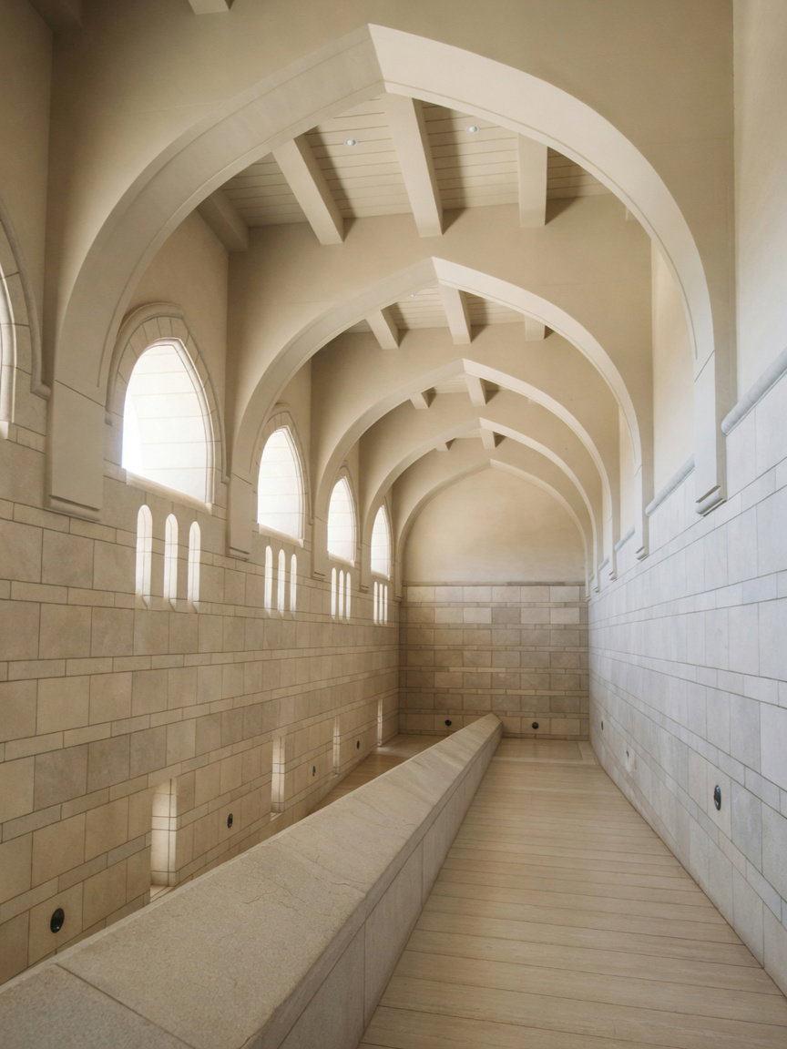 Vaulted Stone Corridor with Arched Windows