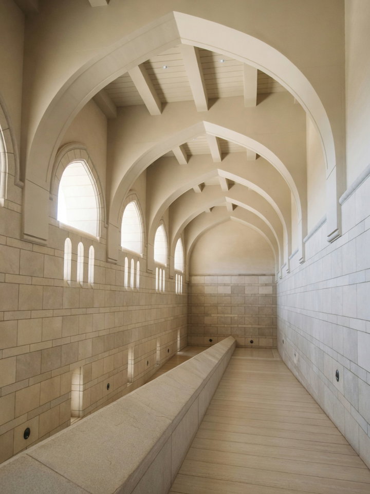 Vaulted Stone Corridor with Arched Windows