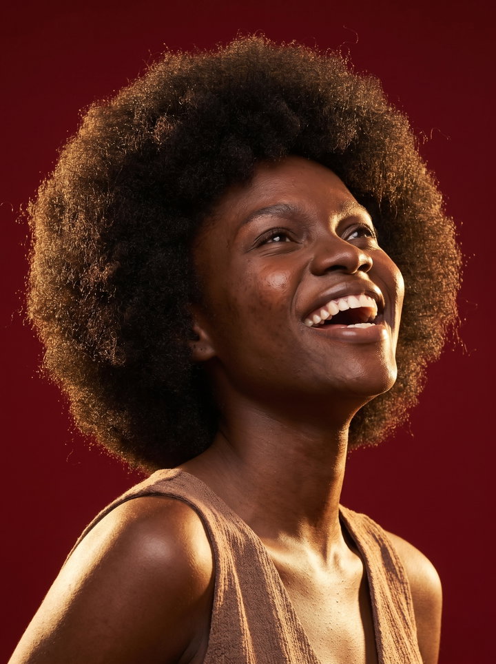 Smiling Woman with Afro Hairstyle