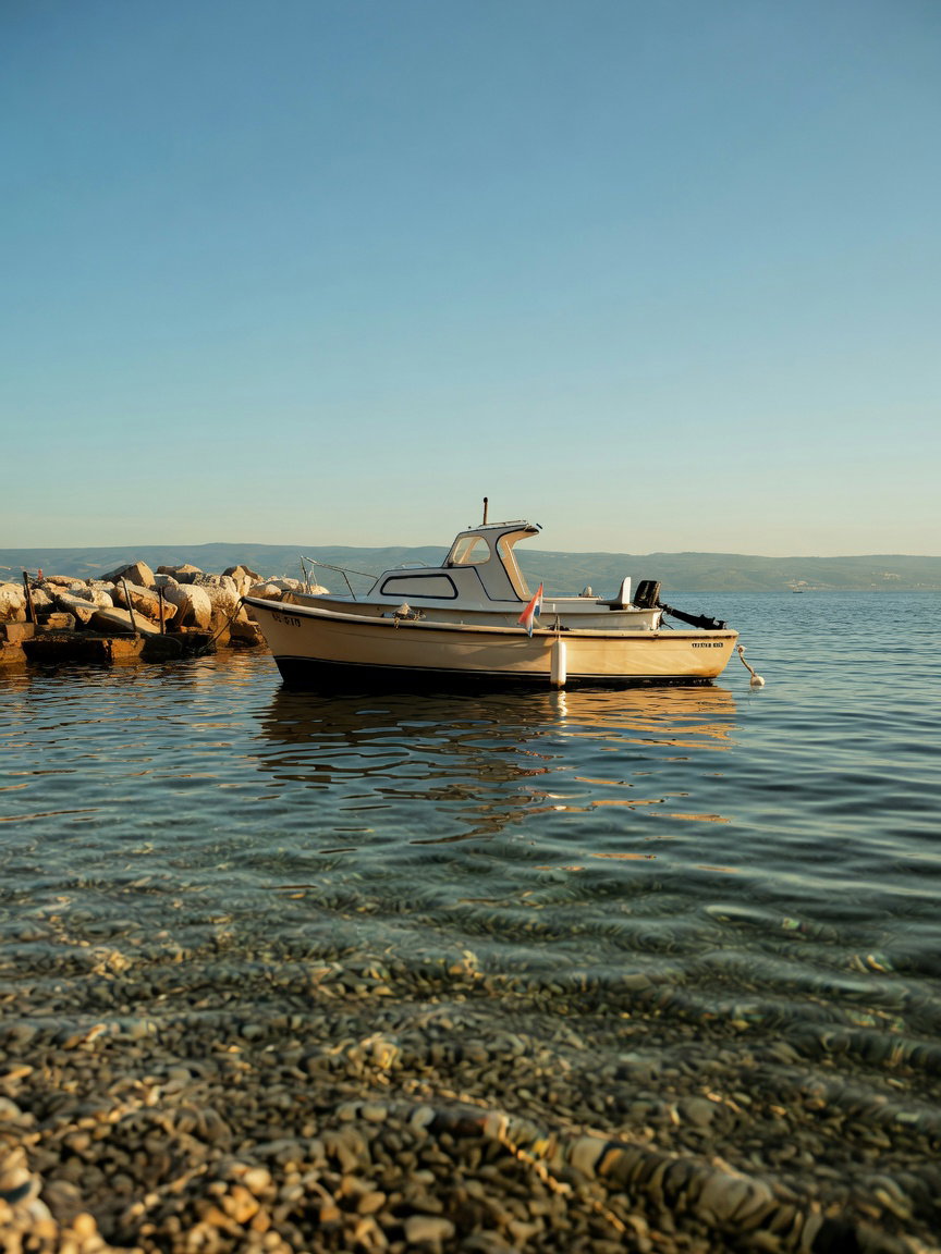 Motorboat Moored in Clear Coastal Water