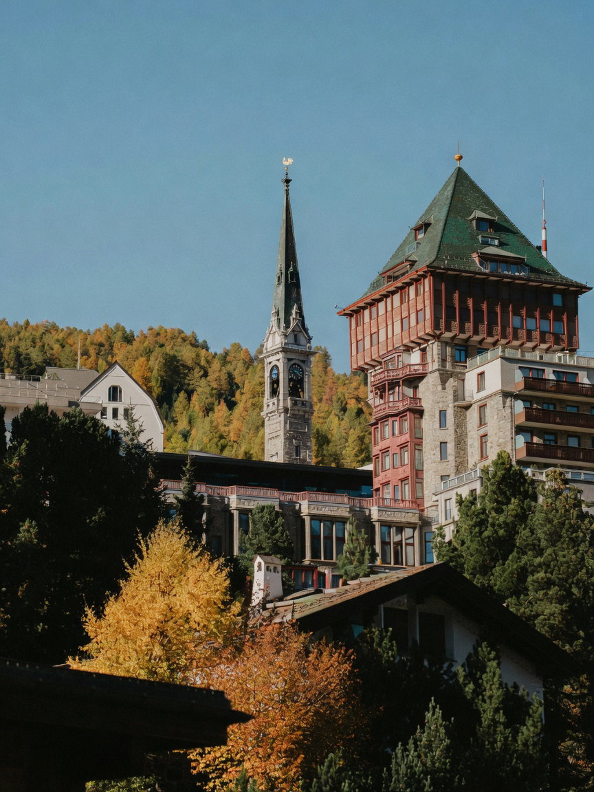 St. Moritz Hotel Tower and Church Spire in Autumn