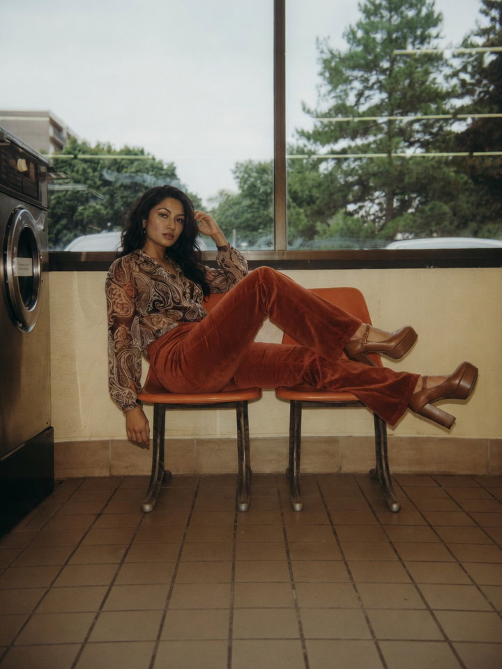 Vintage Fashion Portrait in Orange Chairs