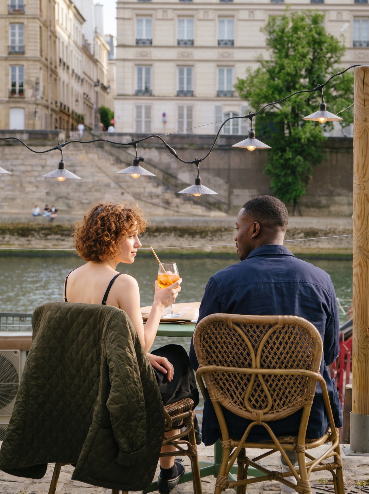 Couple Enjoying Aperitivo by the Seine