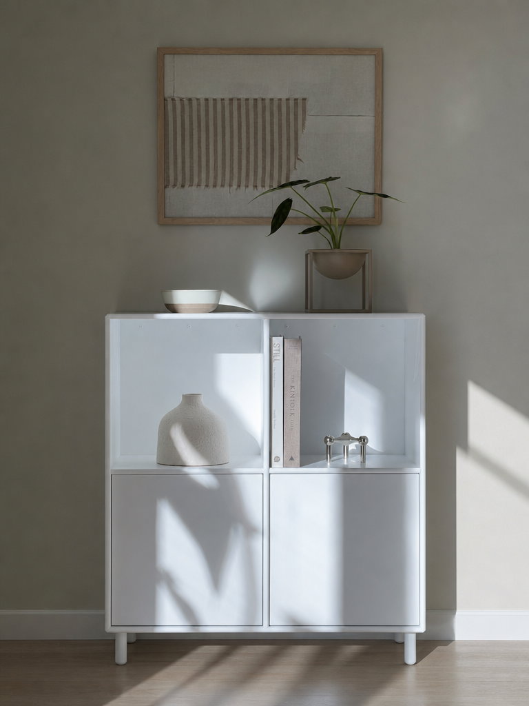 Minimalist White Sideboard with Vase and Books