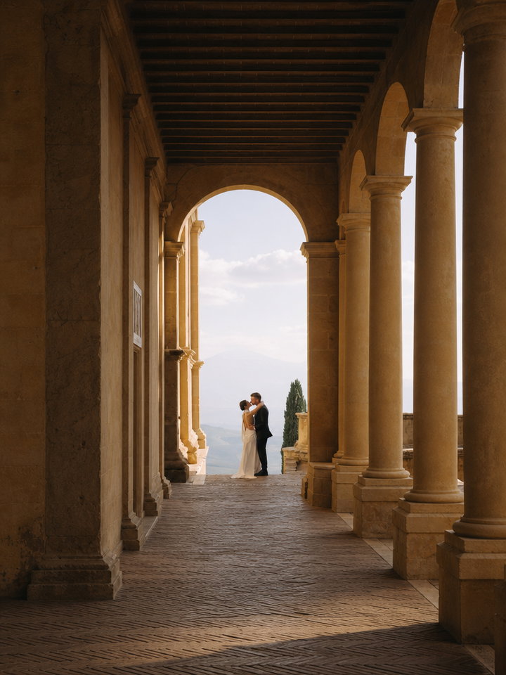Couple Embraced in Tuscan Villa Loggia
