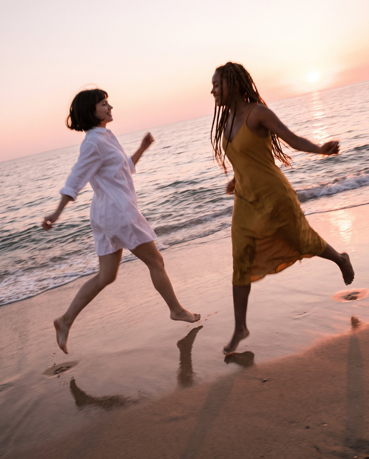 Friends Running on Beach at Sunset