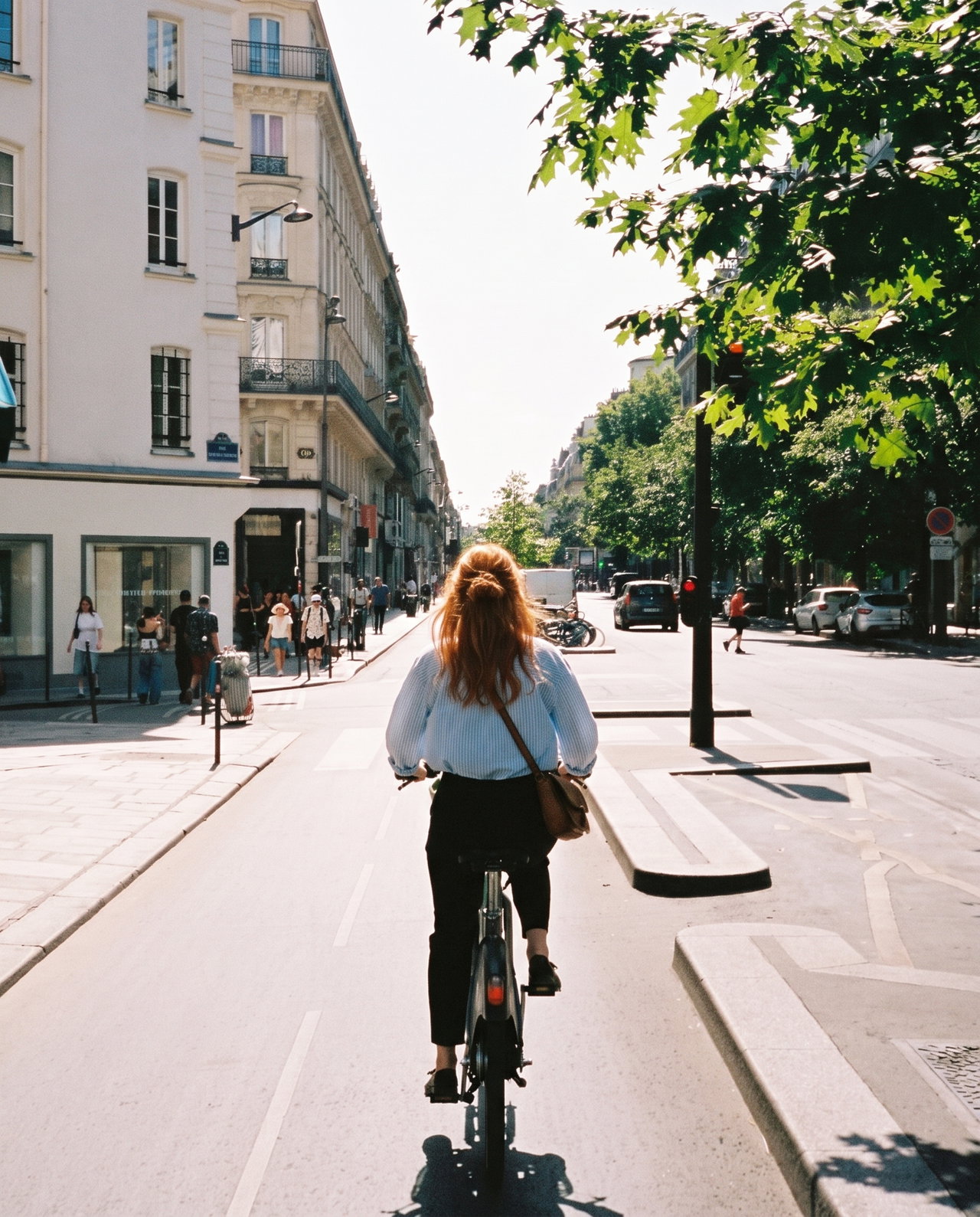 Cycling Woman in Paris Street