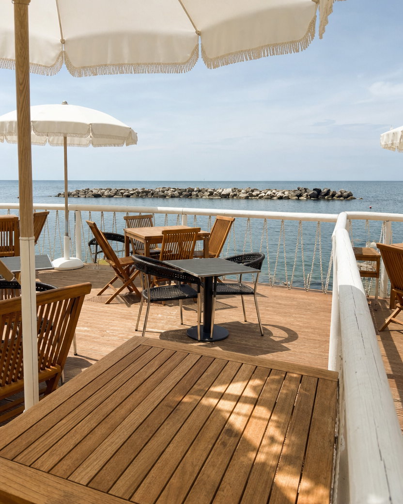 Seaside Restaurant Terrace with Wooden Tables