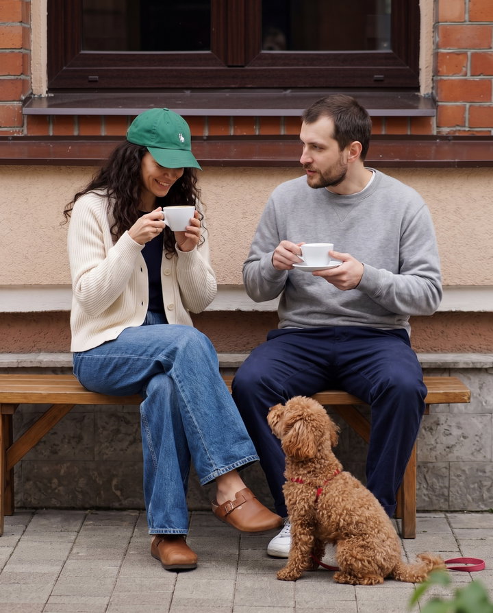 Couple Enjoying Coffee Date with Dog