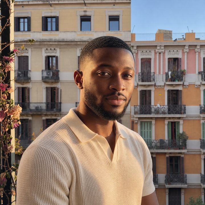 Man on Sunny City Balcony
