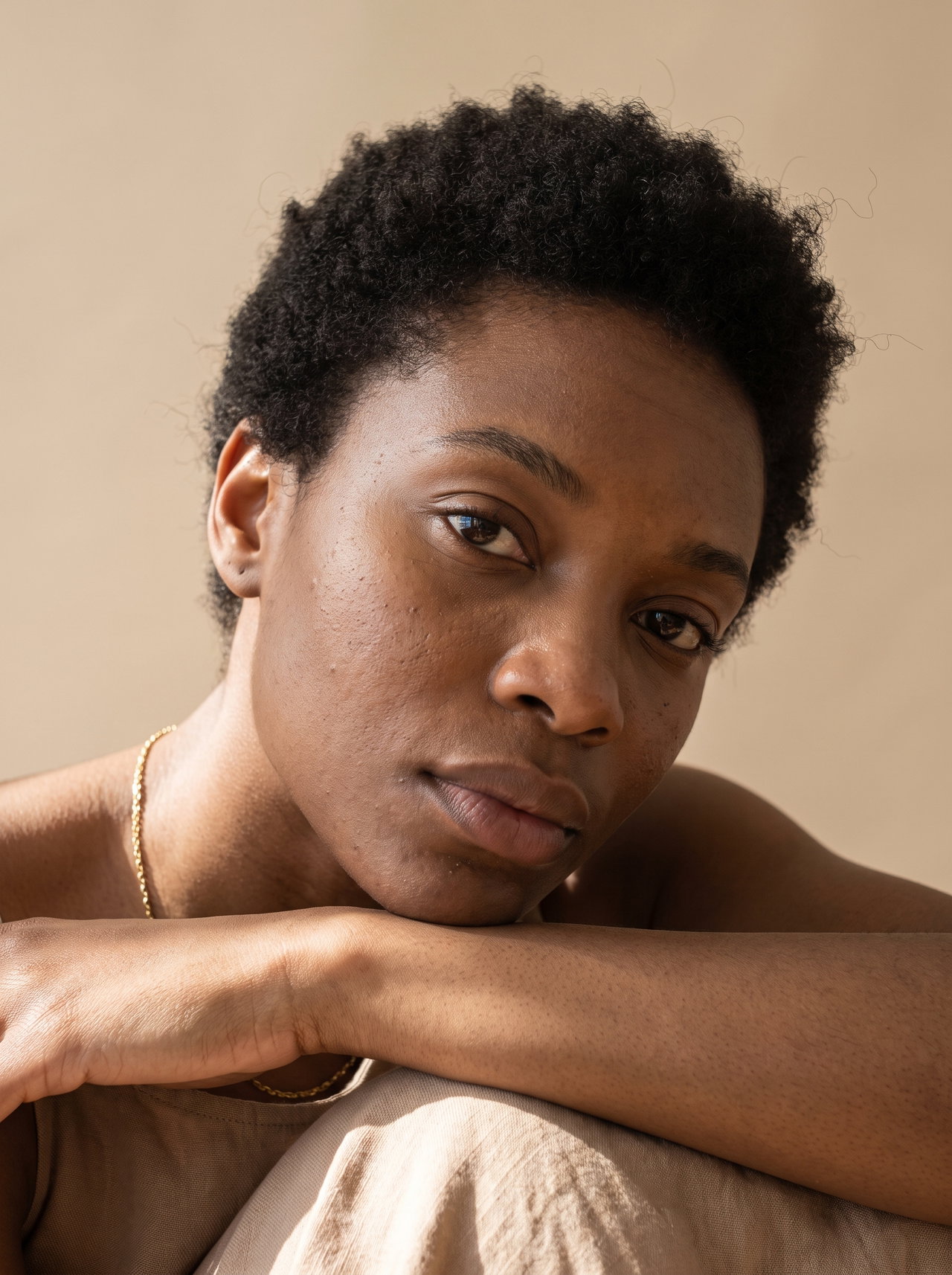 Natural Makeup Portrait of Woman Resting on Arms