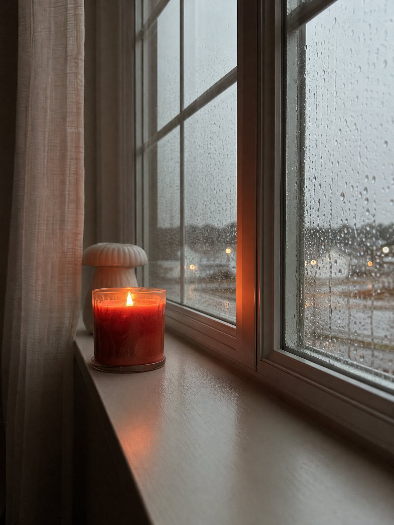 Candle on Rainy Windowsill