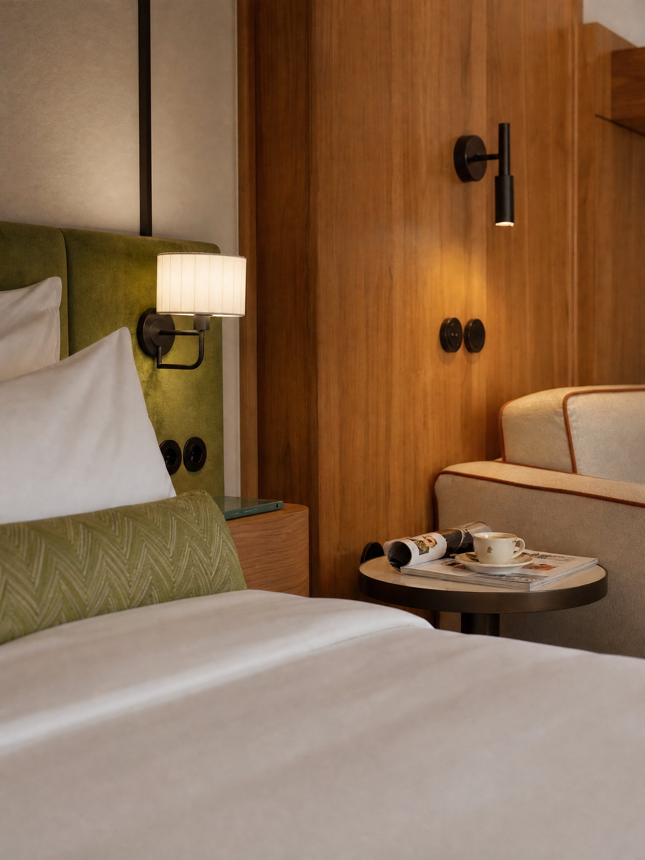 Cozy Hotel Room Corner with Green Headboard