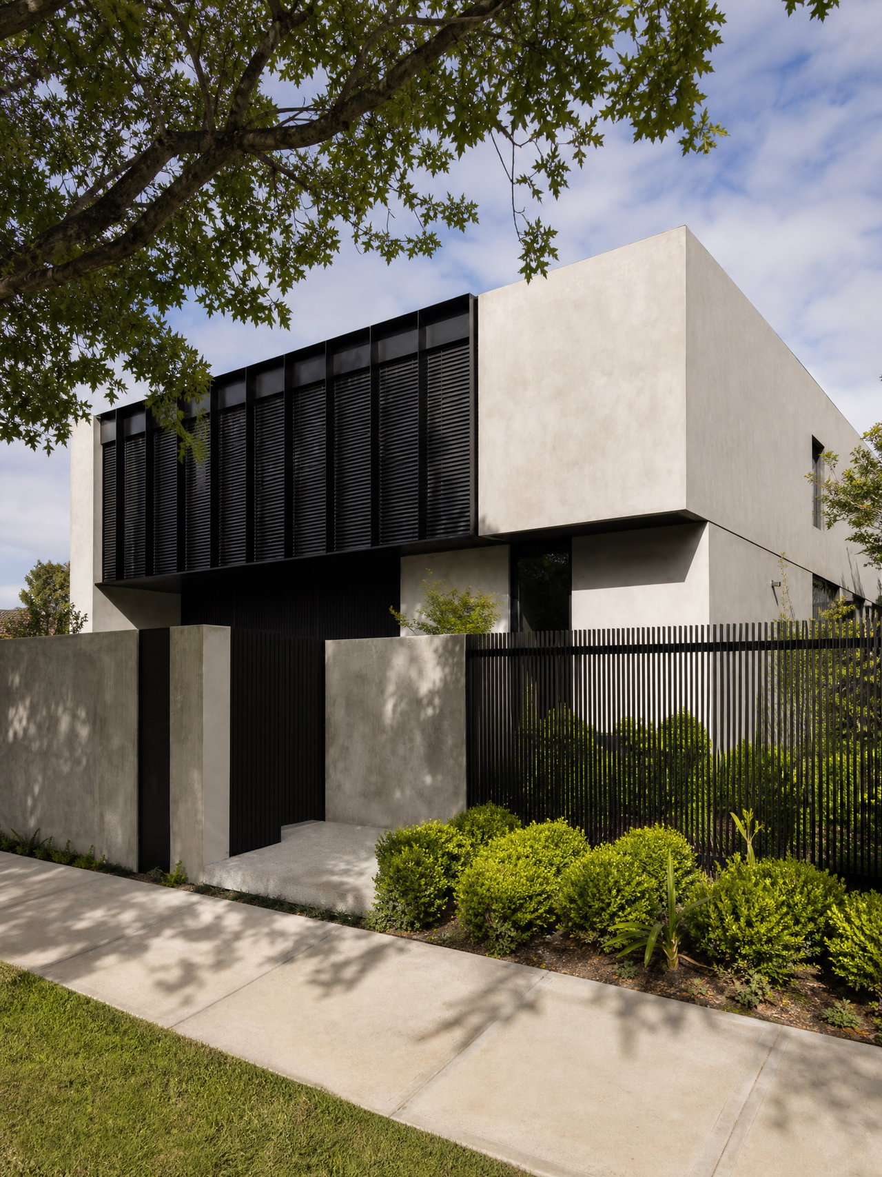 Modern Concrete House with Black Screen