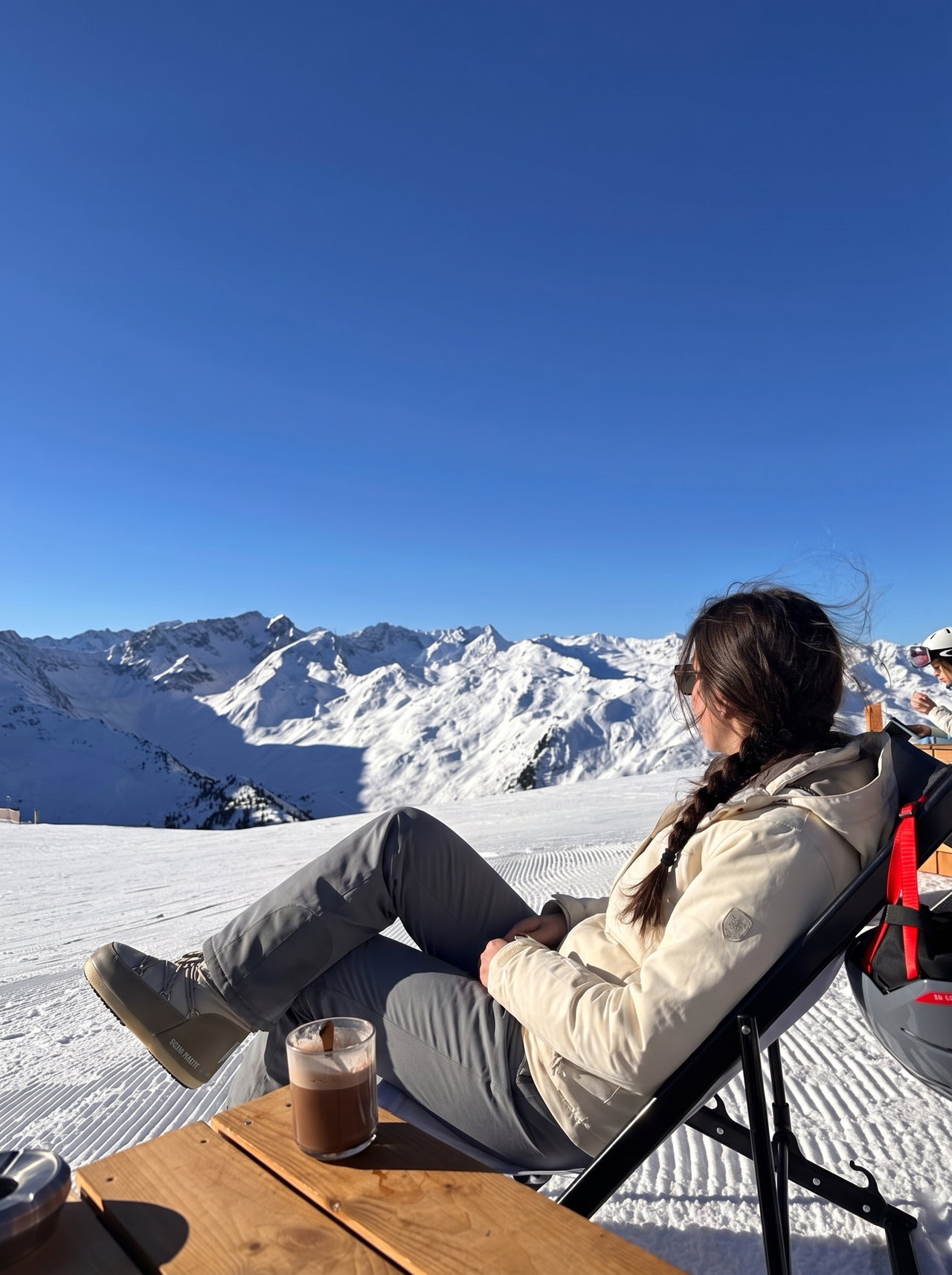 Relaxing on a Ski Terrace in the Alps
