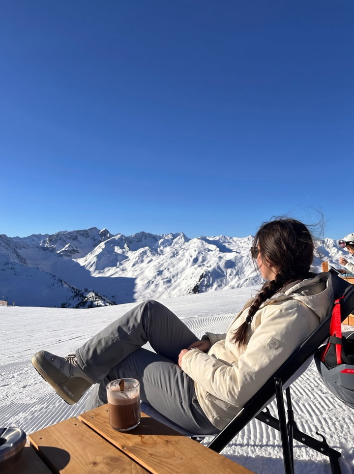 Relaxing on a Ski Terrace in the Alps