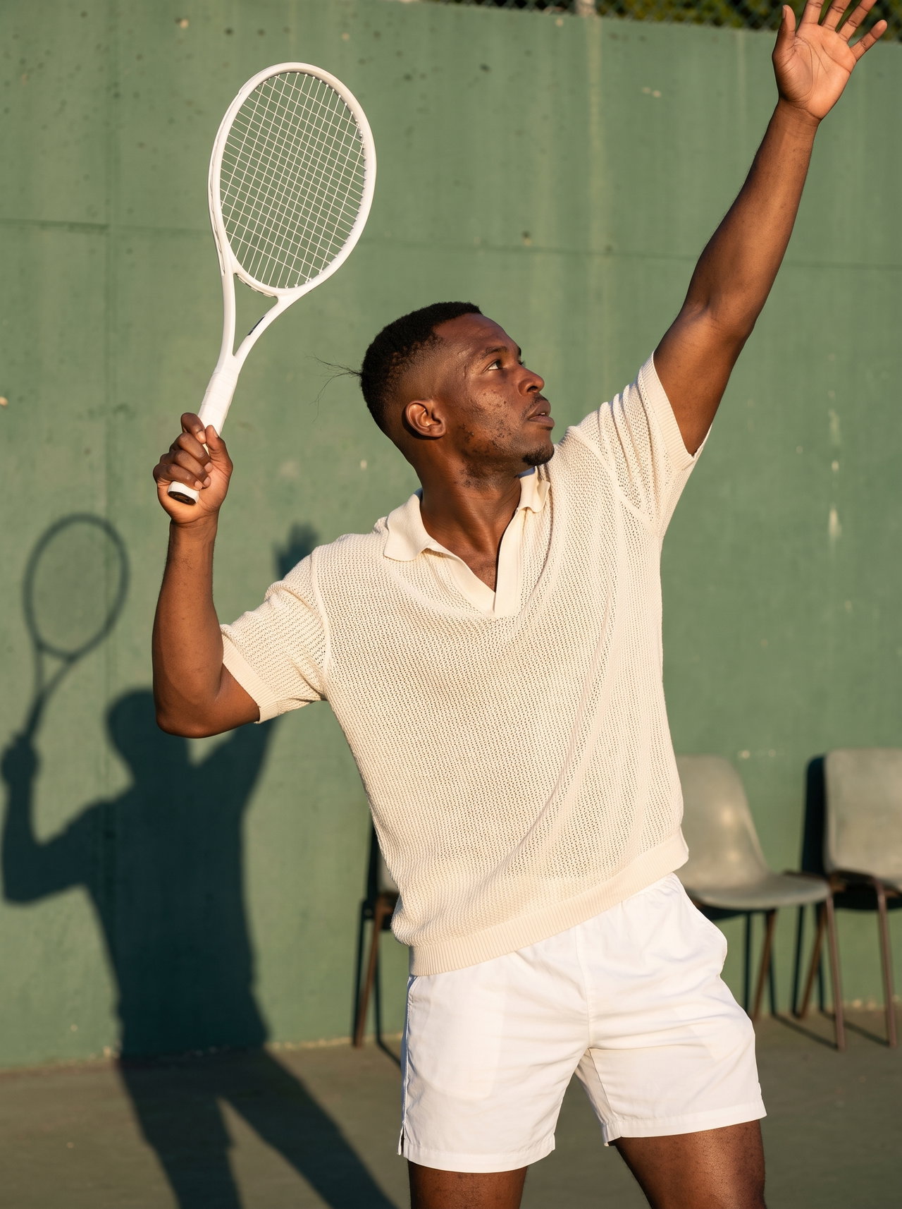Tennis Serve in Evening Light