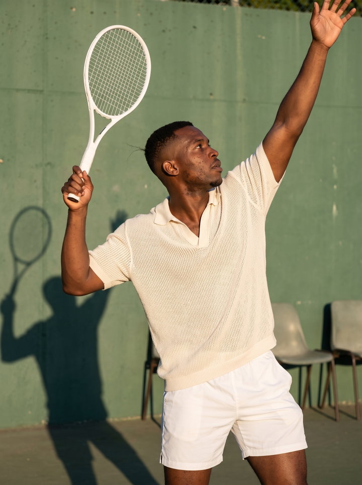 Tennis Serve in Evening Light