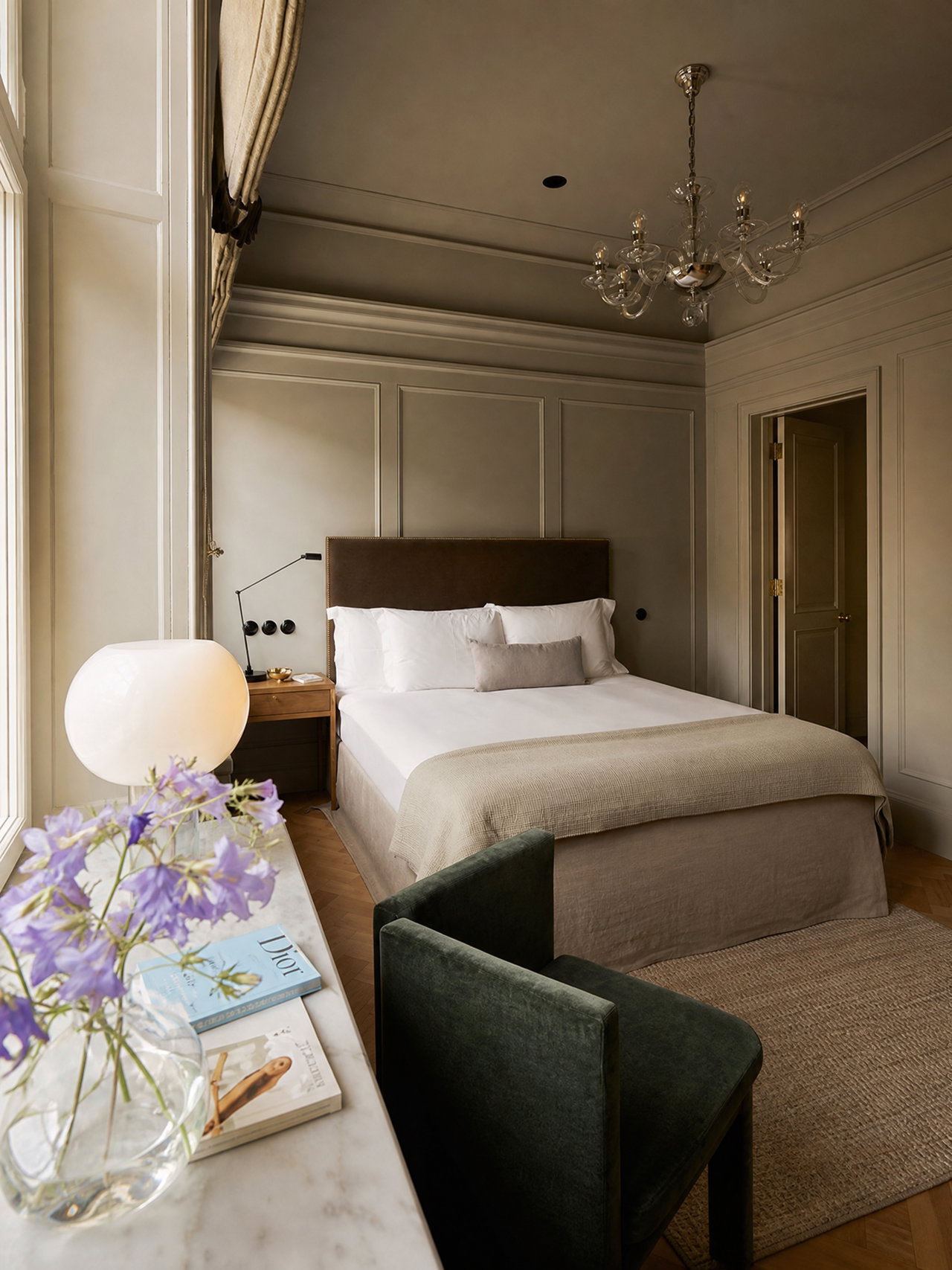 Elegant Hotel Room with Velvet Armchair
