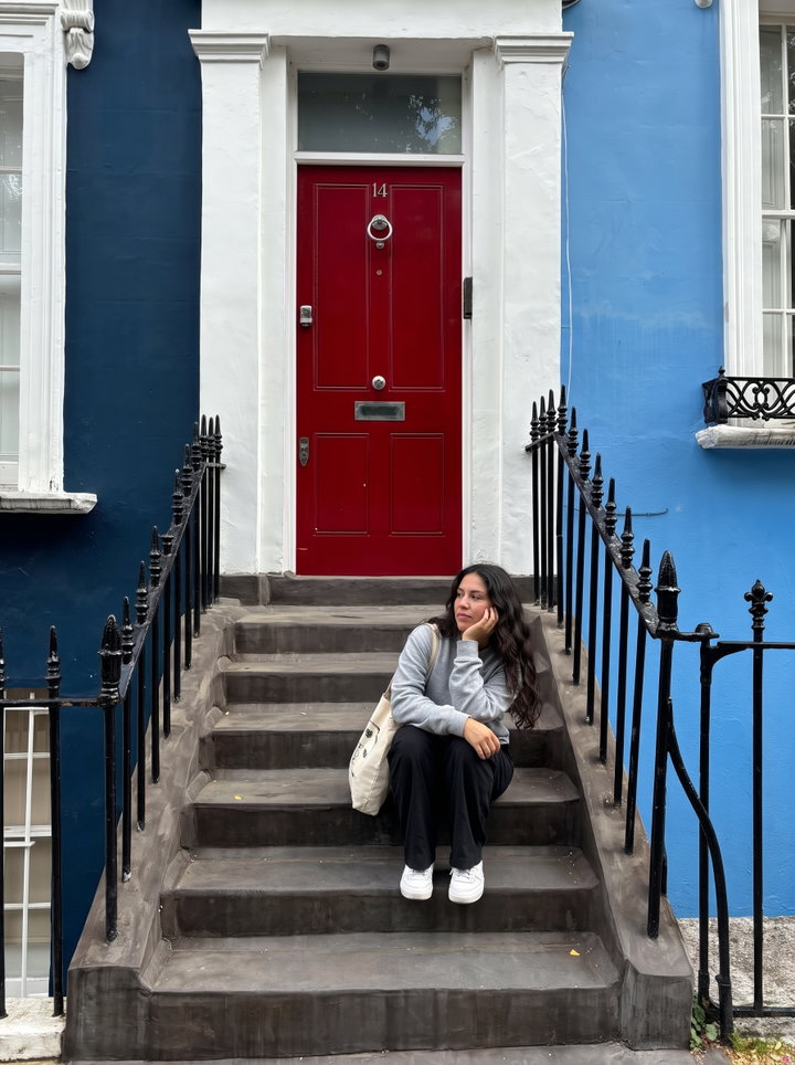 Woman Sitting on Notting Hill Steps