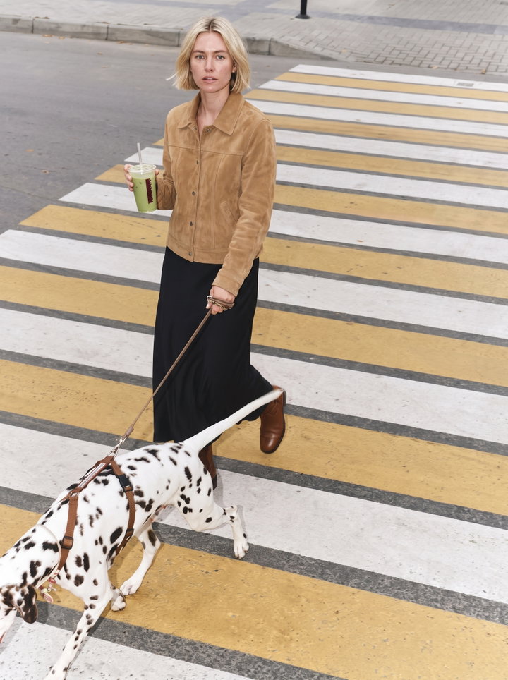 Woman Walking Dalmatian on Zebra Crossing