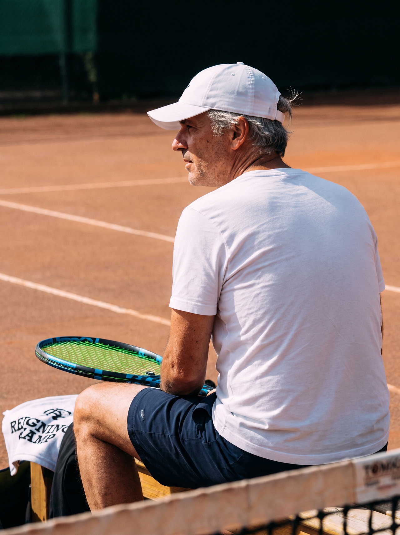 Resting Tennis Player on Clay Court