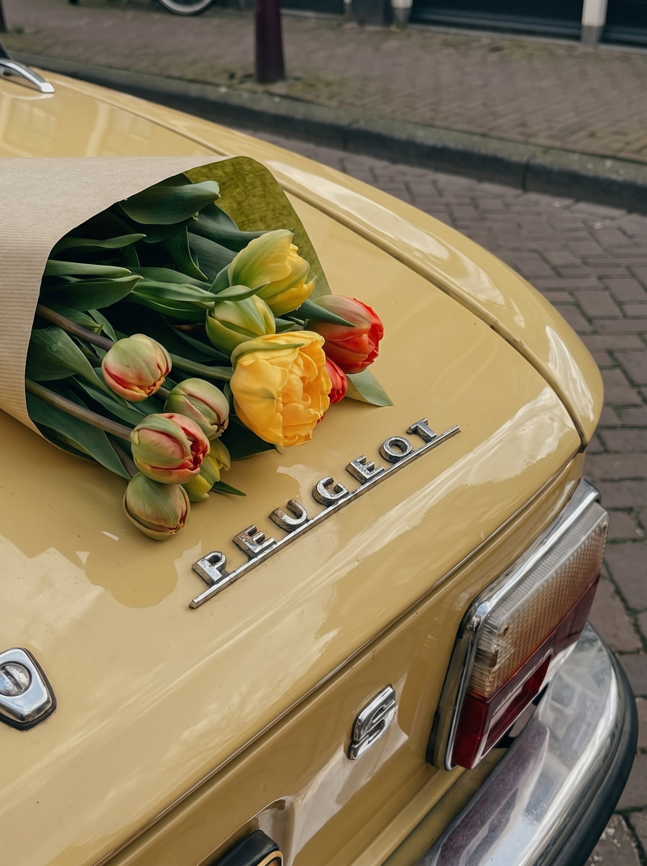 Bouquet of Tulips on Yellow Vintage Peugeot
