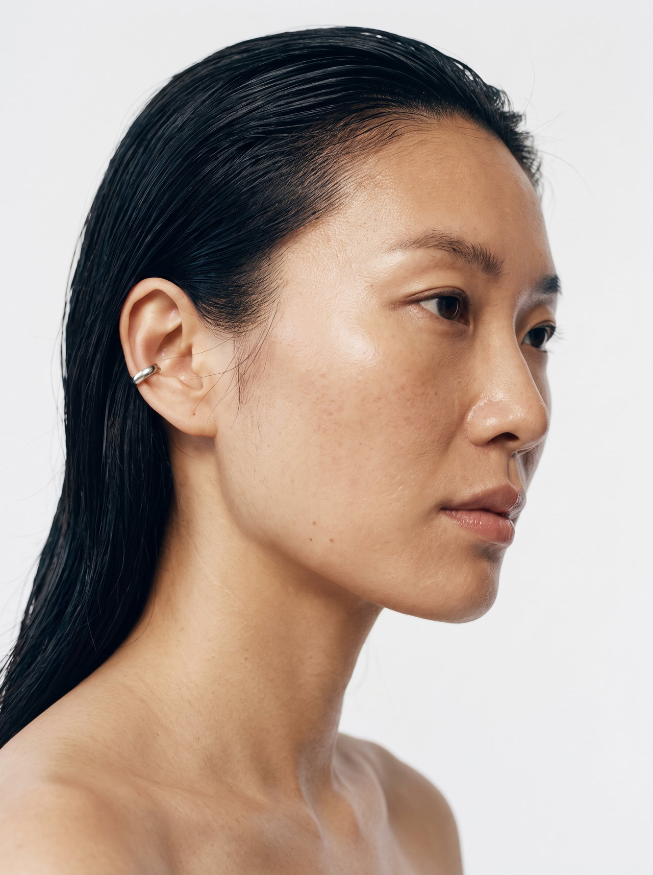 Profile Portrait of Woman with Slicked-Back Hair
