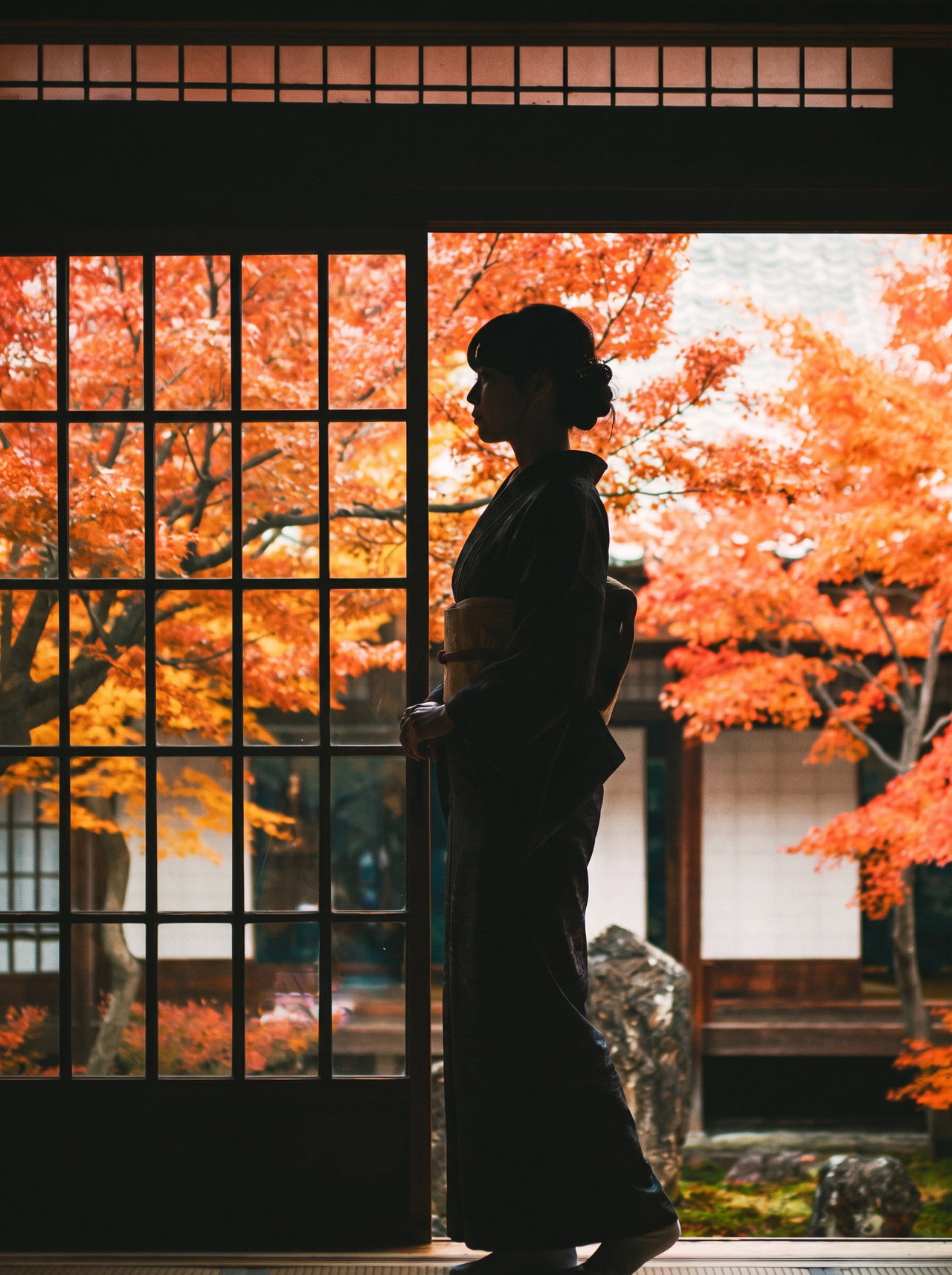 Silhouette of Woman in Kimono at Kyoto Temple Window