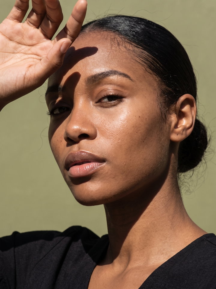 Sunlit Beauty Portrait with Hand Shadows