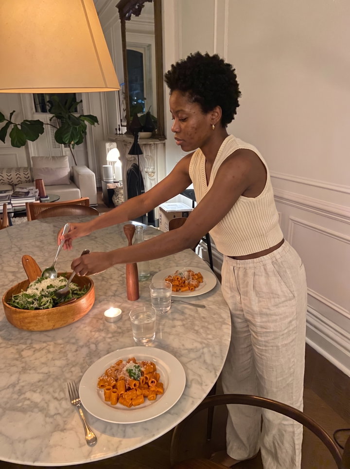 Serving Salad at Marble Dinner Table