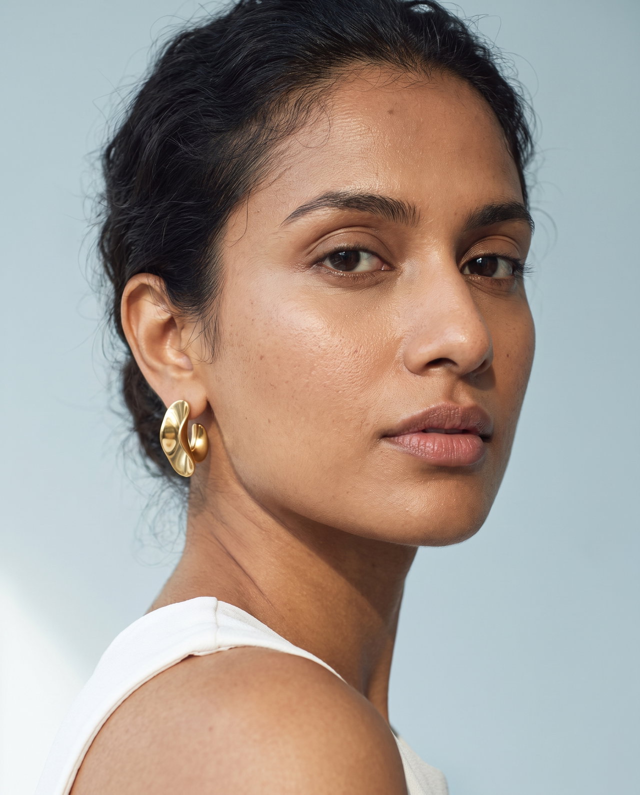 Portrait of Woman with Gold Earrings